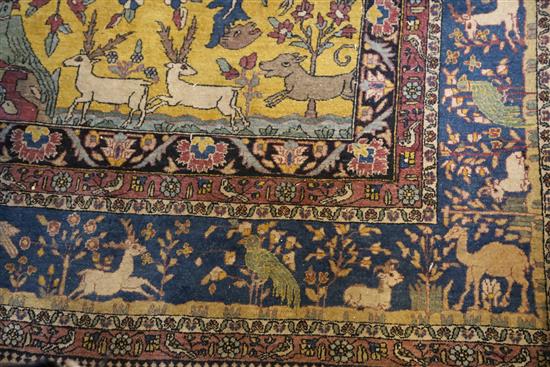 An antique North West Persian Tree of Life yellow ground carpet, 10ft by 6ft 11in.